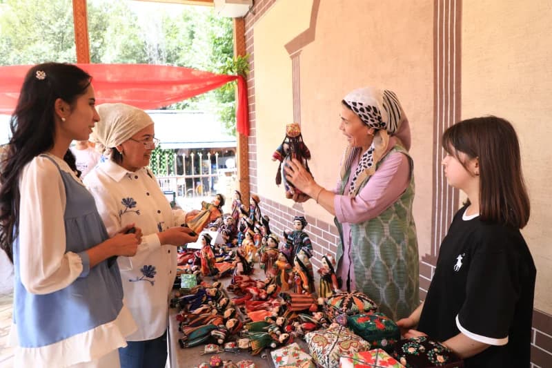 Artisan Demonstrating Traditional Handmade Dolls