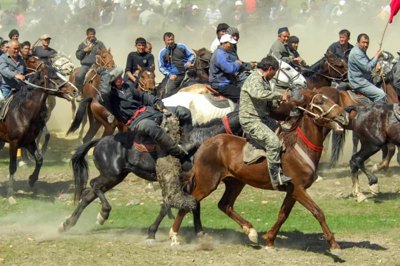 Men Competing in Traditional Buzkashi Match