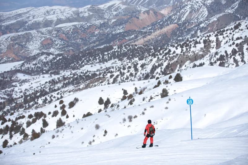Snowboarder on a mountain slope