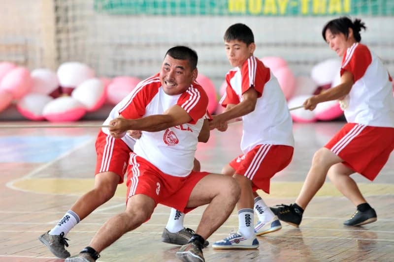 Participants Competing in Tug of War