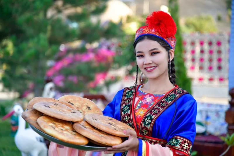 Young woman in traditional Uzbek clothing