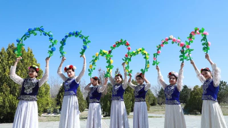 Dancers Perform with Floral Hoops