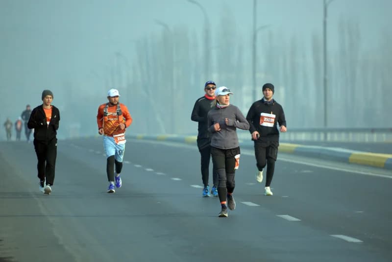Group of runners on road