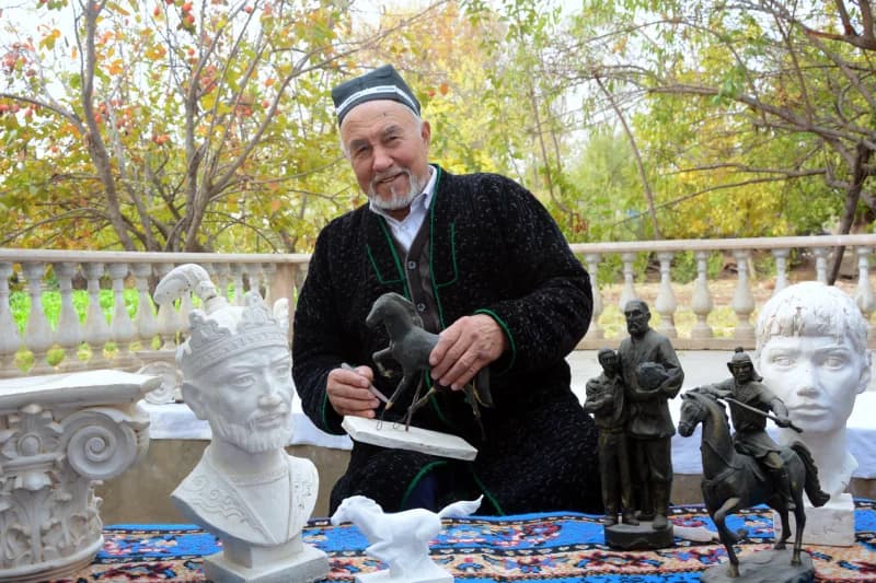 skilled artisan crafting clay sculpture