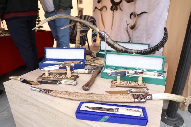 Artisan displays traditional handcrafted knives