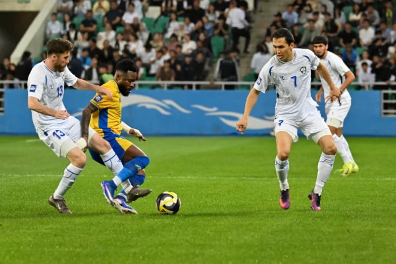 Players compete for soccer ball