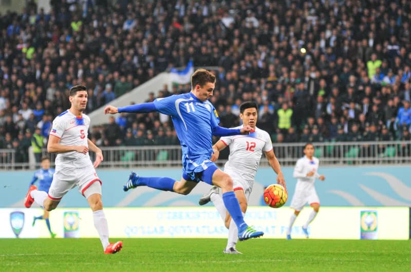 Football player kicking the ball