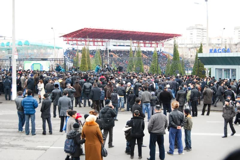 Crowd gathers outside sports stadium