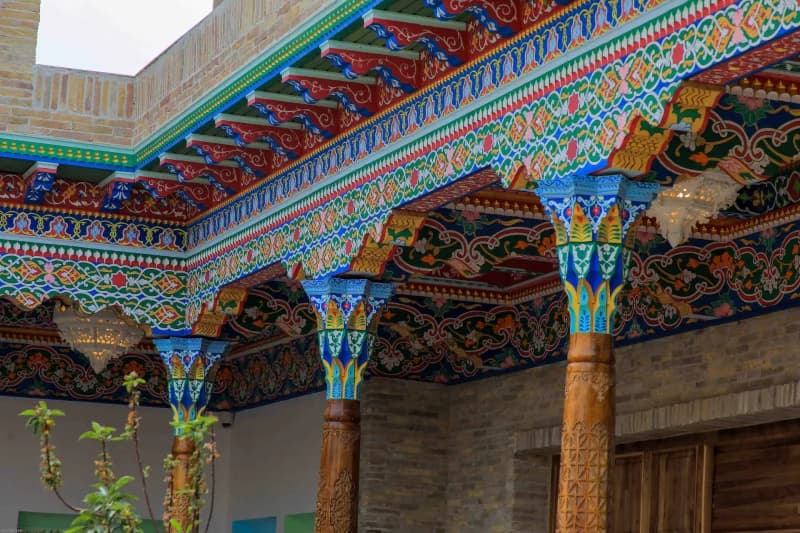 Intricate patterns decorate wooden pillars