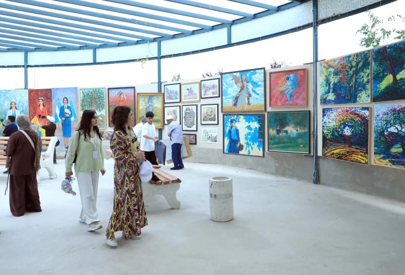 Visitors explore outdoor art exhibition