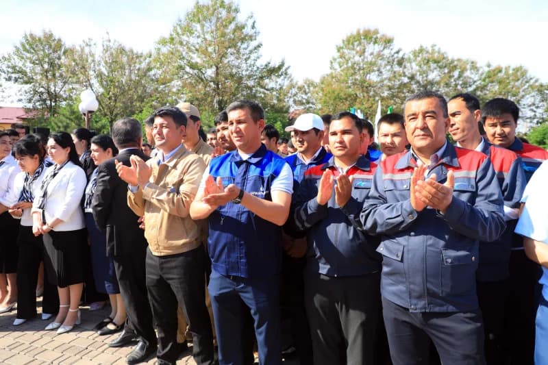Group of people applauding outdoors