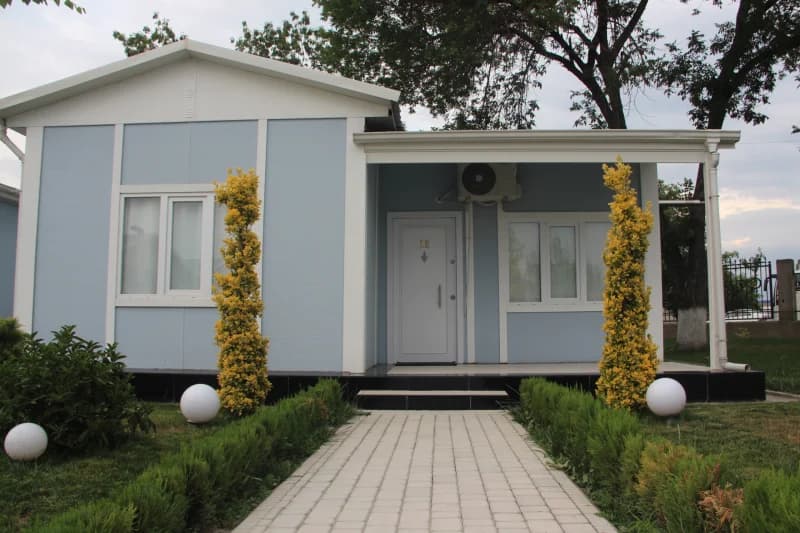 Small light blue residential house