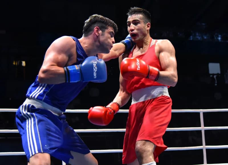 Two boxers competing in ring