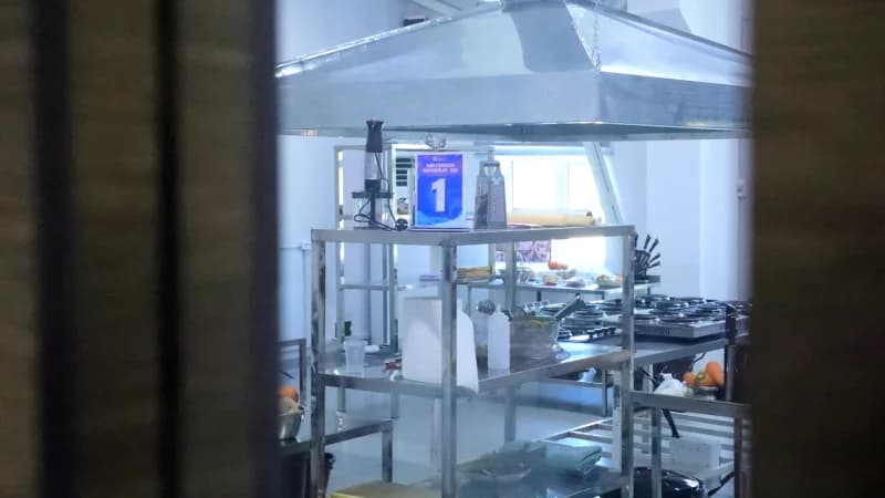 Professional kitchen equipment stands ready