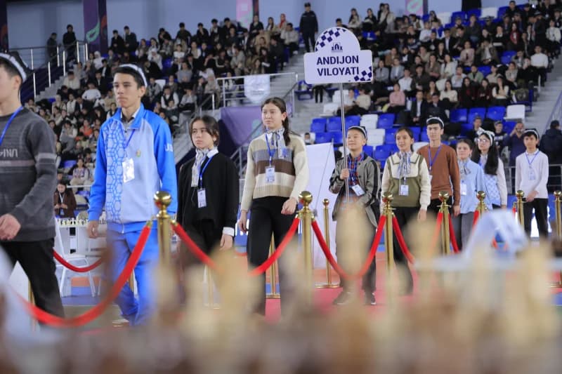 Youth athletes march during ceremony