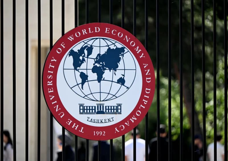 University emblem hangs on gate