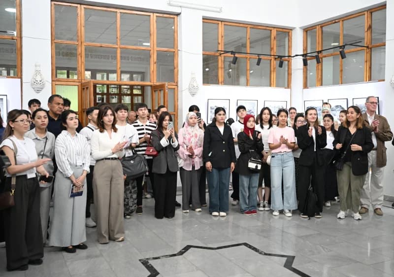 Diverse group attends art exhibition