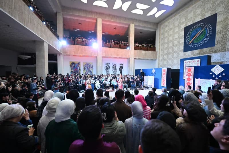 Audience watches cultural festival performance