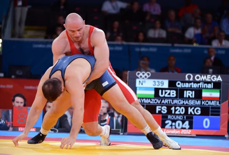 Wrestlers compete in Olympic match