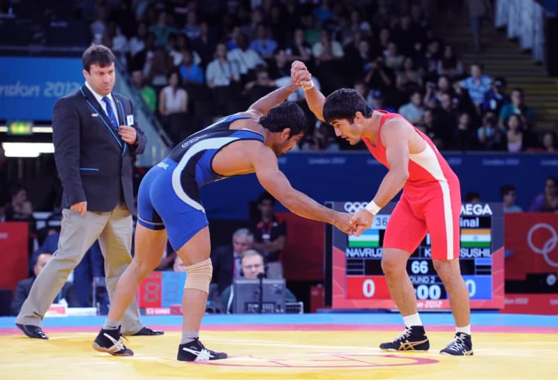 Wrestlers compete on Olympic mat