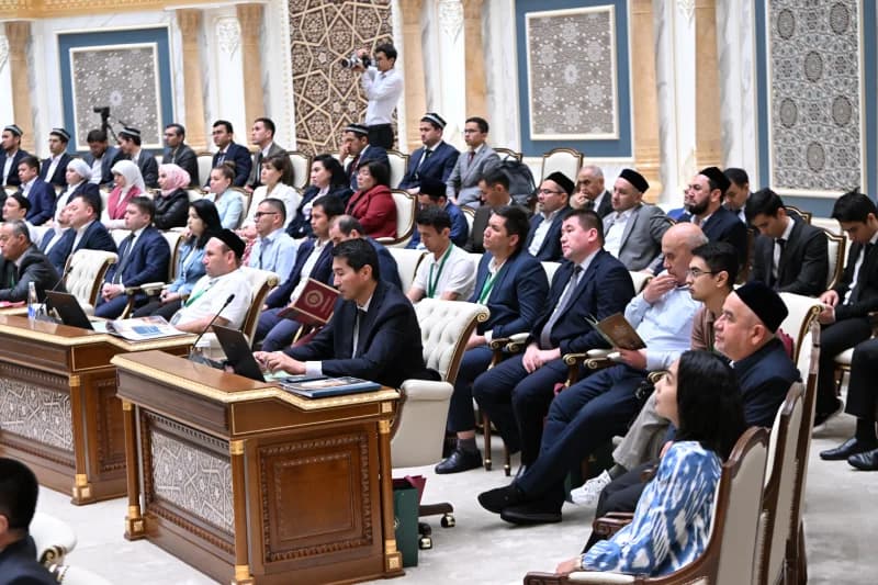 People attending a formal conference
