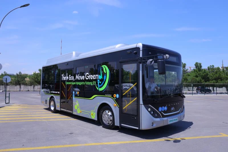 Electric bus parked in lot