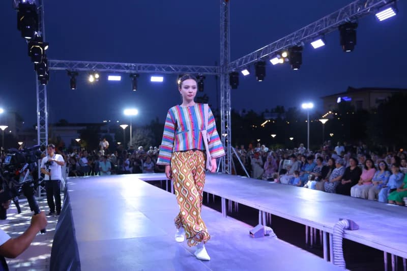 Model walks on outdoor runway