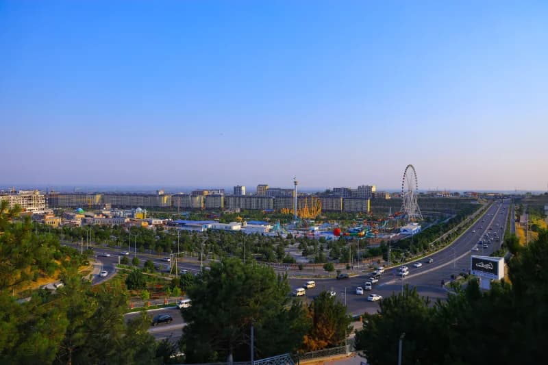 Cars drive along city highway