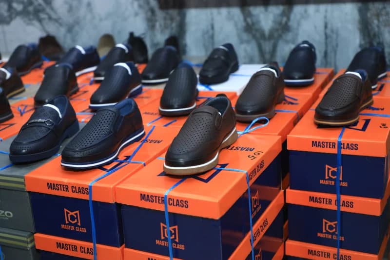 men shoes displayed on boxes
