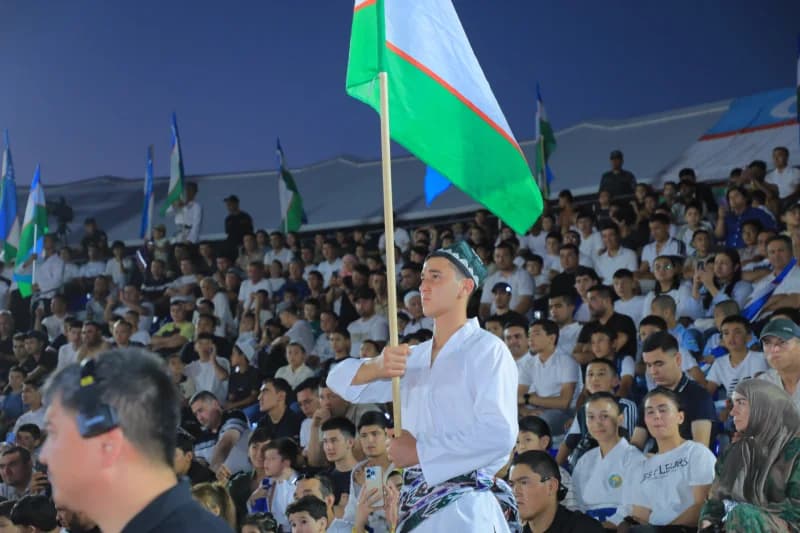 Young man carries national flag