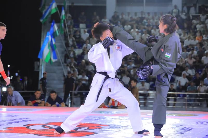 female athletes compete in match