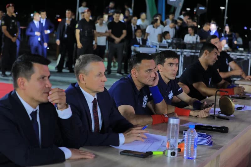 Officials observe event at night