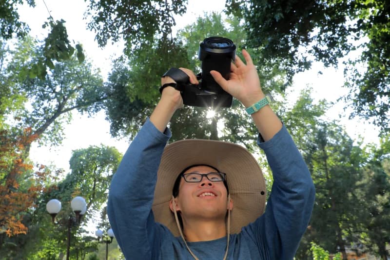 photographer captures images in park