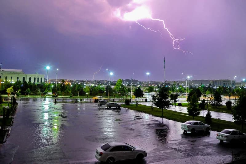 Lightning strikes over city parking