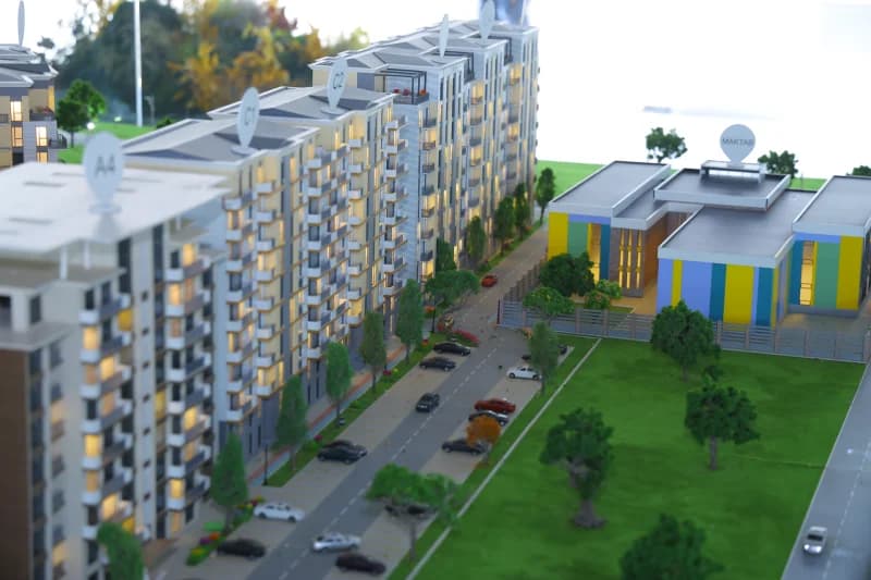 Arxitektura modeli turar-joy majmuasini koʻrsatadi.