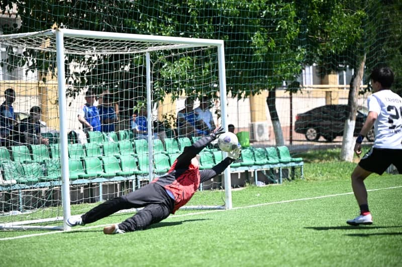 Goalkeeper diving to save goal