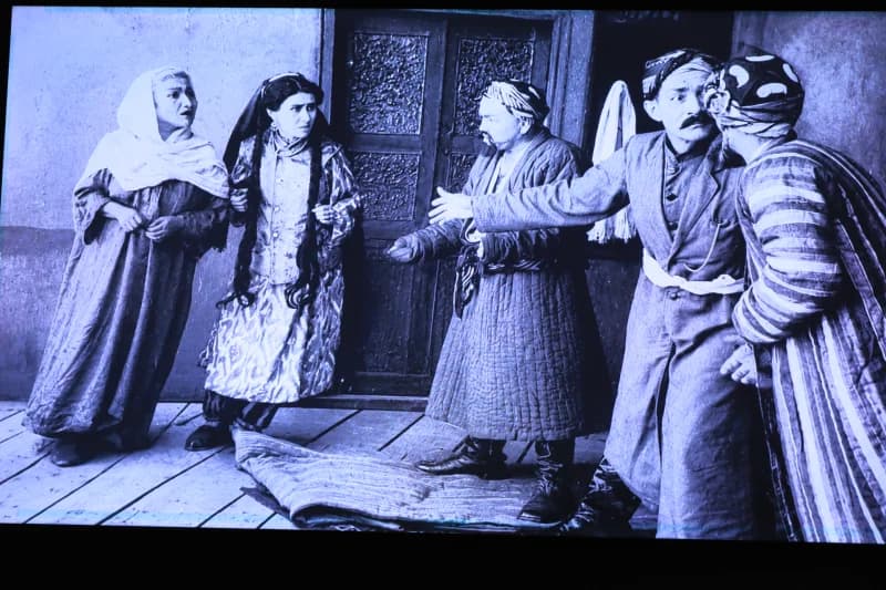 Actors performing in historical play scene