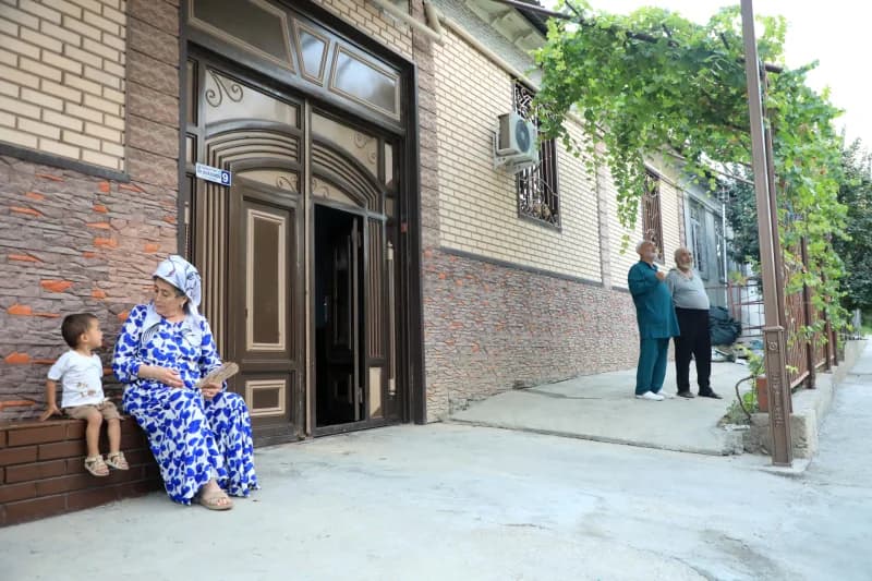 People outside a residential building