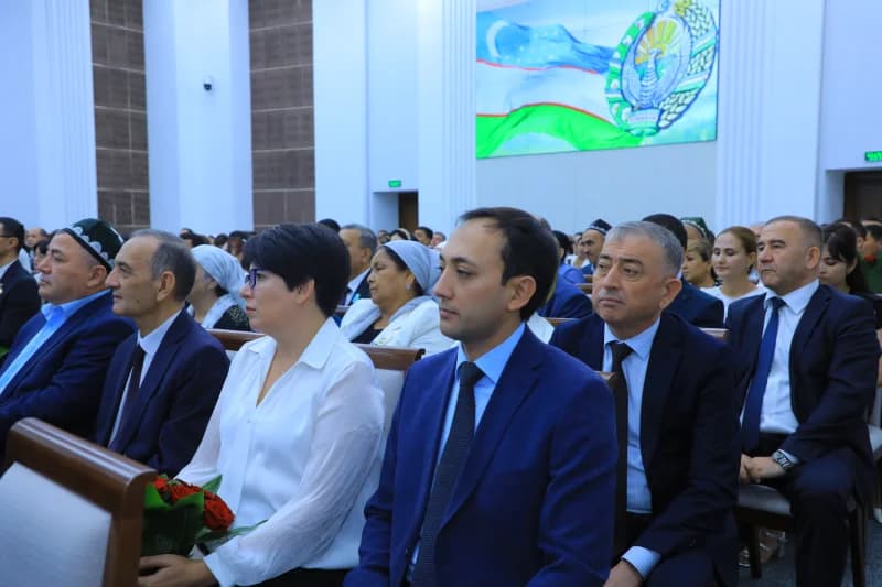 People seated in an auditorium