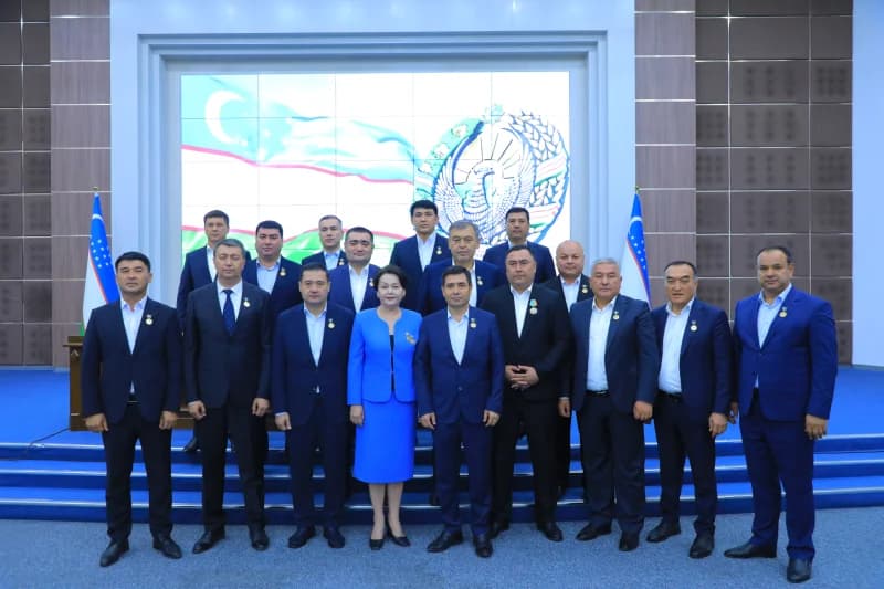 Group portrait of people in formal attire