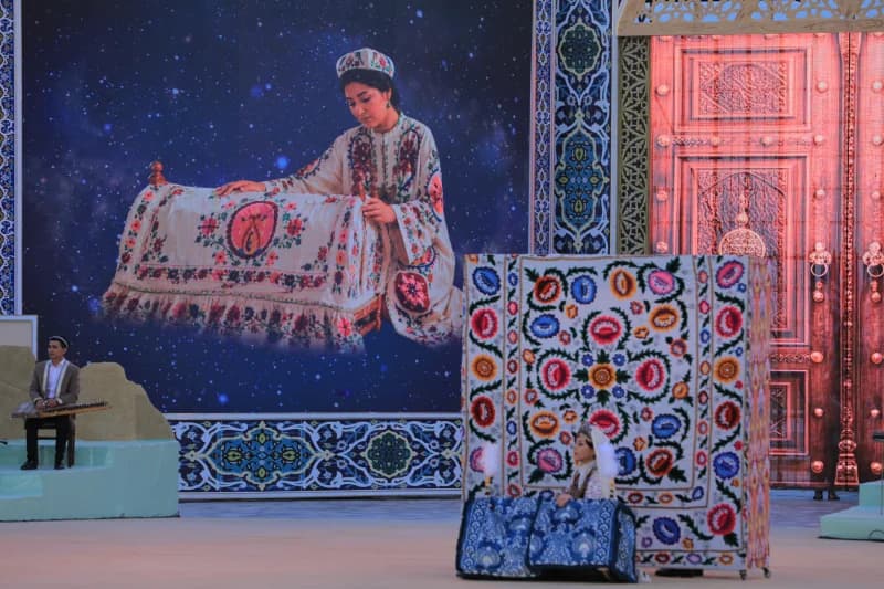 Stage performance with traditional backdrops and performers