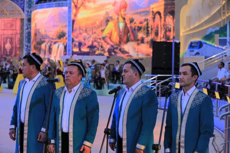 Men performing on stage in traditional attire