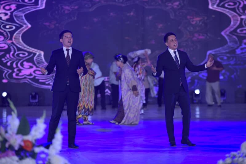 Men performing on stage