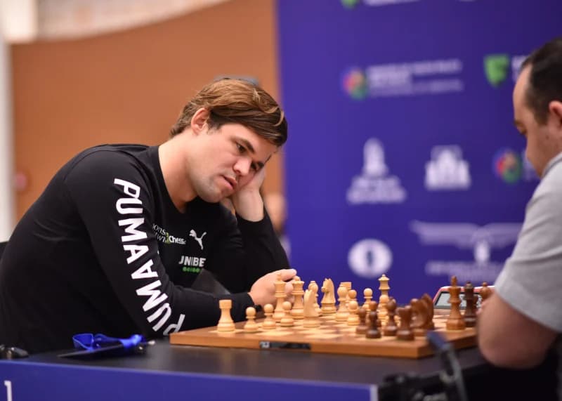 Men playing chess in a competition
