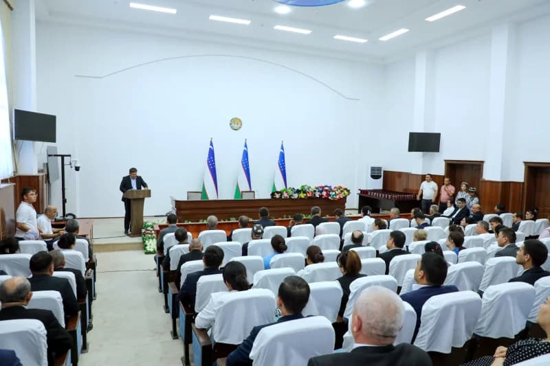 People attending a meeting in a conference hall