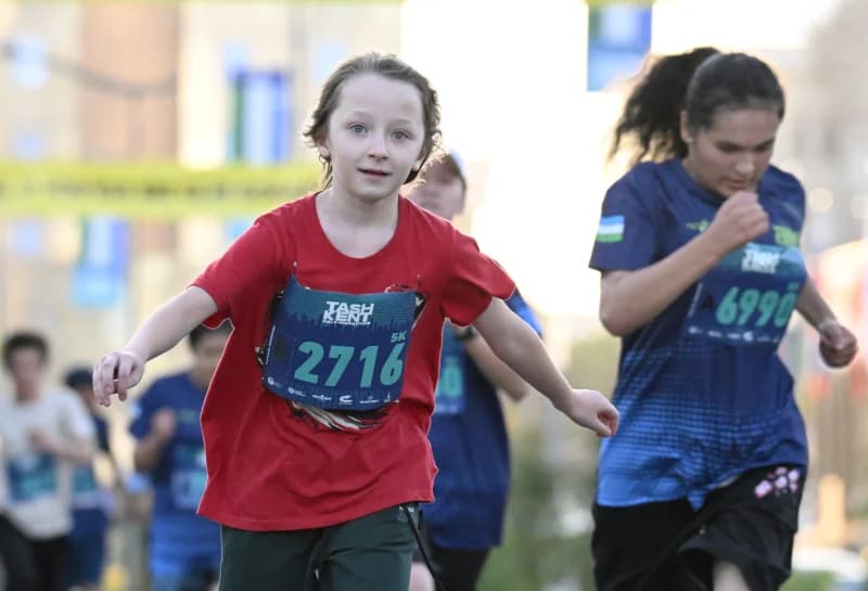 Children running in an outdoor sports competition