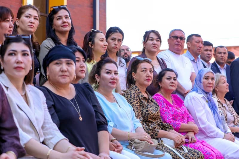 Group of people seated outdoors