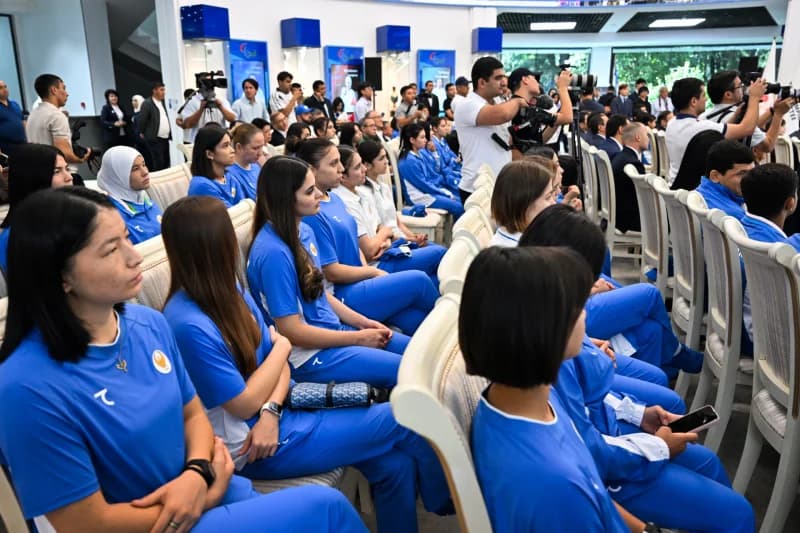 People seated in rows during a gathering