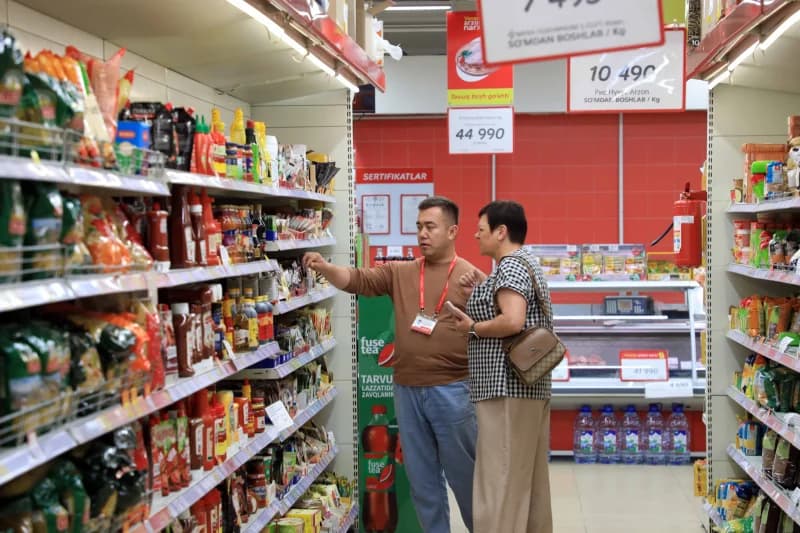 People shopping in a grocery store