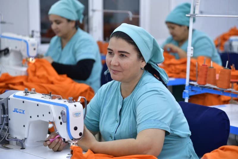 Women working at sewing machines in a workshop